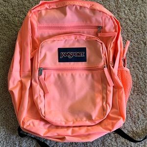 Bright coral/peach double zipper Jansport backpack